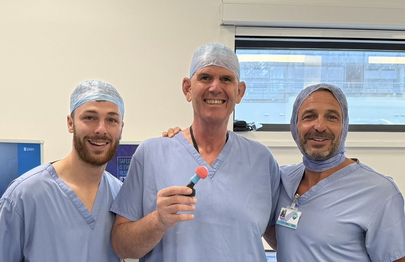 3 surgeons in scrubs